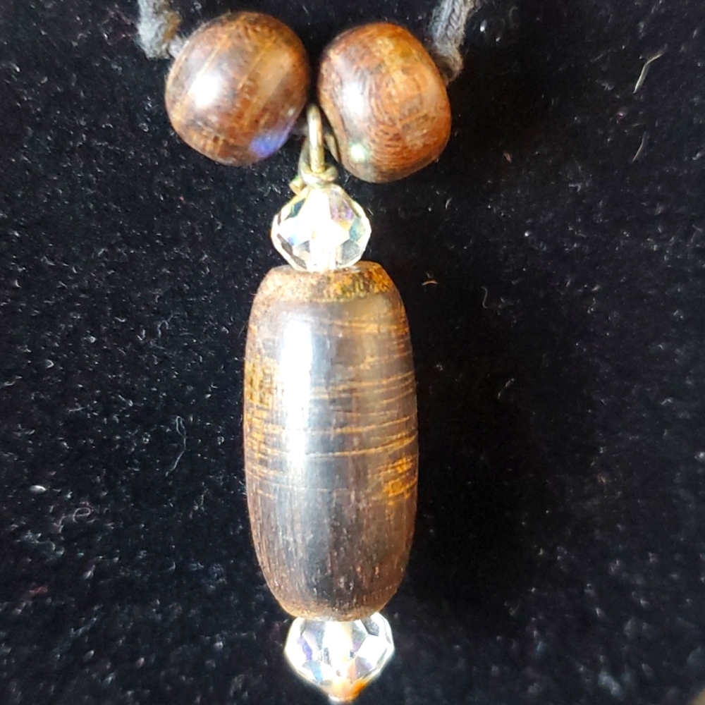 Syracotay wood man's necklace.